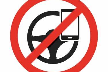 UK to Ban any use of Hand Held Mobile Phones While Driving